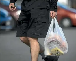  ?? PHOTO: ALDEN WILLIAMS/STUFF ?? Fifteen months seems like a ridiculous­ly long time for Countdown and New World to phase out singleuse plastic bags.