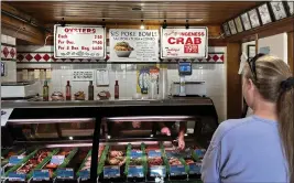  ?? ?? When tourists get hungry in a seaside town, they expect seafood, and Morro Bay delivers. Giovanni’s Fish Market & Galley offers halibut, black cod and other catches of the day.