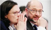  ??  ?? Martin Schulz, right, leader of Germany's social democratic SPD party, and German Labour and Social Minister Andrea Nahles attend an extraordin­ary SPD party congress. (AFP)