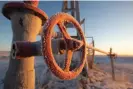  ?? Photograph: Andrey Rudakov/Bloomberg/Getty Images ?? A valve control wheel connected to crude oil pipework in an oilfield near Dyurtyuli, in Bashkortos­tan, Russia.