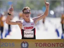  ?? ASSOCIATED PRESS FILE PHOTO ?? Evan Dunfee won the men’s 20 km race walk at the Pan Am Games in Toronto in 2015.