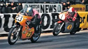  ??  ?? Below: Dave Croxford on the works Mk4 Seeley G50 leads Giacomo Agostini’s MV Agusta in 1971’s Race of the South at Brands Hatch