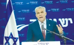  ?? (Marc Israel Sellem/The Jerusalem Post) ?? YESH ATID chairman Yair Lapid speaks at a party meeting at the Knesset yesterday.