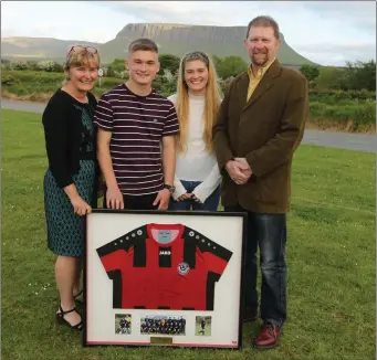  ??  ?? Seamas Keogh with his family, including mum Catherine and dad Jimmy.