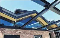  ??  ?? Steel and vintage bricks feature in the rooftop garden. The pergola will be partially covered.