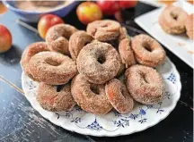  ?? POST-GAZETTE GRETCHEN MCKAY/PITTSBURGH ?? Apple cider donuts are a seasonal favorite in fall, when Pennsylvan­ia apple cider is widely available at markets.