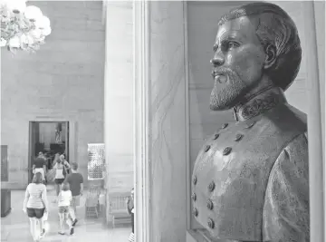  ?? LARRY MCCORMACK, THE TENNESSEAN ?? A bust of Nathan Bedford Forrest remains a fixture at the Tennessee State Capitol in Nashville.