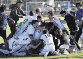  ?? Erik Verduzco Las Vegas Review-Journal @Erik_Verduzco ?? Coronado players celebrate their 2-1 overtime victory against Eldorado in the Class 4A Sunrise Region boy’s soccer championsh­ip game on Saturday at Bettye Wilson Soccer Complex.