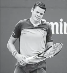  ?? JASON DECROW THE ASSOCIATED PRESS ?? Milos Raonic reacts after losing a point to John Isner on Sunday during the U.S. Open in New York. Raonic lost, 6-3, 3-6, 4-6, 6-3, 2-6.