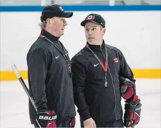  ?? DAVE HOLLAND THE CANADIAN PRESS ?? Coaches Ken Babey, left, and Luke Pierce have Canada up against the U.S. for Paralympic gold for the first time.