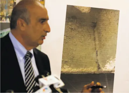  ?? Paul Kuroda / Special to The Chronicle ?? Mark Zabaneh, executive director of the Transbay Joint Powers Authority, shows one of the two beams that are cracked. The beam is above Fremont Street, between Mission and Howard streets. The second, smaller crack is in a parallel steel beam.