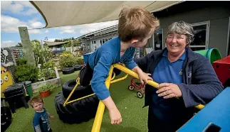  ?? PHOTO: DAVID UNWIN/STUFF ?? Sue Mcglasson working with Ollie Mcglasson, 1, left, and Kurtis Jyde, 4, at Lollipops Educare.