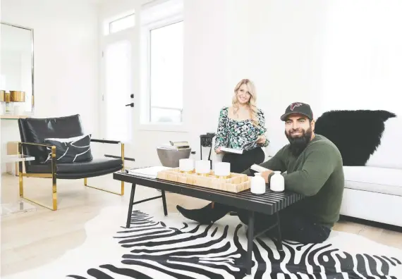  ?? DON MOLYNEAUX ?? Gurjot and Amy Bhullar were attracted to the large, open floor plan of the townhome they have purchased in Artis at Greenwich, a New York-inspired infill community.