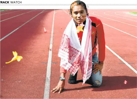  ?? RITU RAJ KONWAR ?? Her heart and soul are here: Hima Das worships athletics and does puja to the track at the Sarusajai Sports Complex in Guwahati on September 07, 2018 on her return from the Asian Games.