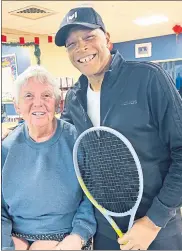  ?? COURTNEY DIENER-STOKES / FOR MEDIANEWS GROUP ?? Catharine Delcamp, a tennis player at Hillcrest, with tennis instructor Ira Thomas Watts, III.