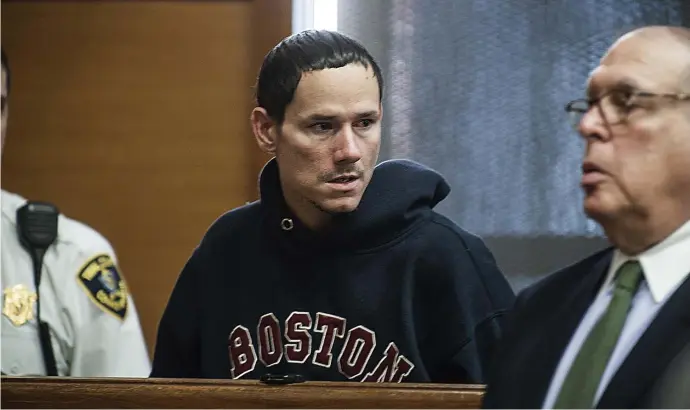  ?? POOL PHOTO ?? IN COURT: Aneudy Delgado Torres, charged with two counts of murder and gun charges, is arraigned Wednesday in Framingham District Court.
