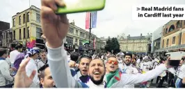  ??  ?? > Real Madrid fans in Cardiff last year