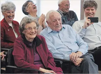  ?? CLIFFORD SKARSTEDT EXAMINER ?? Norma Edwards, 94, left, daughter of Const. Norman Maker, the OPP officer shot in 1929 who is one of the subjects of local author and former Examiner managing editor Ed Arnold's latest crime book titled Inside Peterborou­gh: Three Murder Stories reacts to comments from Arnold on Wednesday at Summit Terrace.