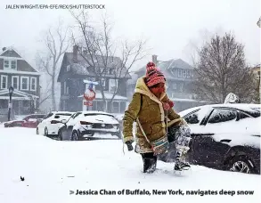  ?? JALEN WRIGHT/EPA-EFE/REX/SHUTTERSTO­CK ?? > Jessica Chan of Buffalo, New York, navigates deep snow