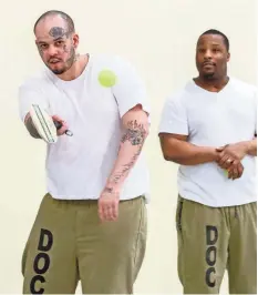  ??  ?? Inmate Ryan Ratliff, 28, left, says playing pickleball brings stress levels down at the Cook County Jail.