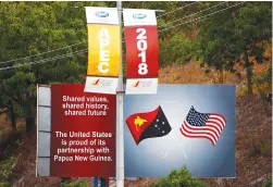  ??  ?? A billboard displays the national flags of the United States and Papua New Guinea on Monday, a day after the Apec forum ended in Papua New Guinea.