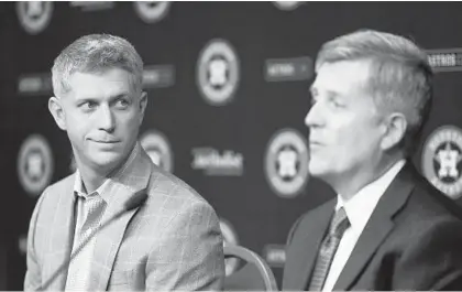  ?? KAREN WARREN/HOUSTON CHRONICLE ?? Orioles executive vice president/general manager Mike Elias, left, pictured in 2015, worked under Astros general manager Jeff Luhnow, right, for several years in St. Louis and Houston. Astros owner Jim Crane fired Luhnow and manager AJ Hinch on Monday in the wake of MLB’s findings regarding Houston’s sign-stealing scandal.