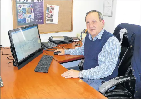  ??  ?? IN TOUCH: Nelson Mandela University’s Govan Mbeki Mathematic­s Developmen­t Centre (GMMDC) director Prof Werner Olivier is the driving force behind the new TouchTutor® Quiz app