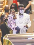  ?? Godofredo A. Vásquez-Pool/Getty Images ?? Mourners view the remains of George Floyd during a public visitation at the Fountain of Praise church Monday in Houston.