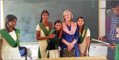  ?? SUBMITTED PHOTOS ?? Mary Cairns is all smiles in a classroom in India, as she teaches the girls how to avoid becoming sex slaves.