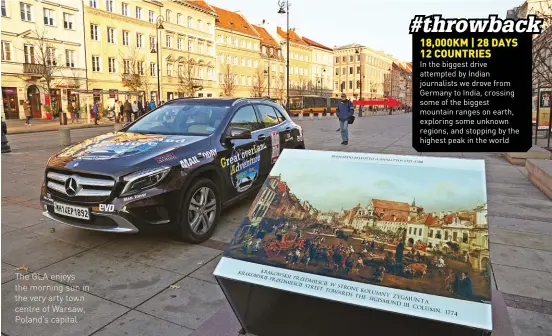  ??  ?? The GLA enjoys the morning sun in the very arty town centre of Warsaw, Poland’s capital