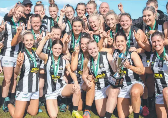  ??  ?? Glenorchy players celebrate winning the inaugural women’s State League grand final over Ulverstone at North Hobart Oval. Picture: Linda Higginson
