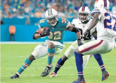  ?? MIKE EHRMANN/GETTY IMAGES ?? Kenyan Drake was the year’s best story, but he simply replaced Jay Ajayi’s impact last year. Most players took steps back. Coupled with injuries, the demise of “winning culture” and drama off the field, the Dolphins finished 6-10 and out of the playoffs.