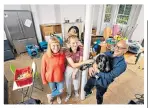  ??  ?? Life changing: Paul and family, above, in their living room after the floods, top