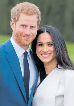  ??  ?? Gaining a growing band of fans… Meghan with Prince Harry