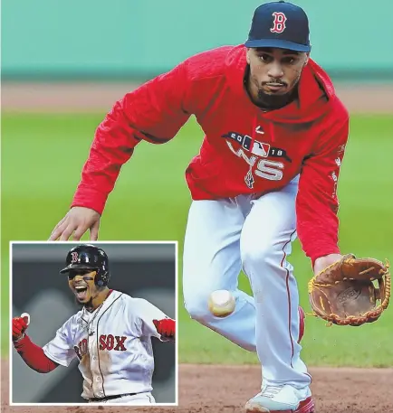  ?? STAFF PHOTOS BY STUART CAHILL ?? FIND A SOLUTION: Mookie Betts, who could be moved to the infield to allow J.D. Martinez to play the outfield in the National League park during the World Series, takes groundball­s yesterday at Fenway.