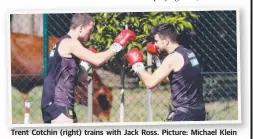  ??  ?? Trent Cotchin (right) trains with Jack Ross. Picture: Michael Klein