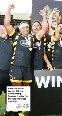  ?? PICTURES: Getty Images ?? Back-to-back: Wasps lift the Premiershi­p Sevens trophy for the second year running