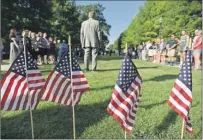  ?? AP PHOTO ?? Dr. Steven Angle, chancellor of the University of Tennessee, speaks at a gathering at the Chattanoog­a campus Friday to honor four Marines who were killed Thursday in attacks on two military facilities.