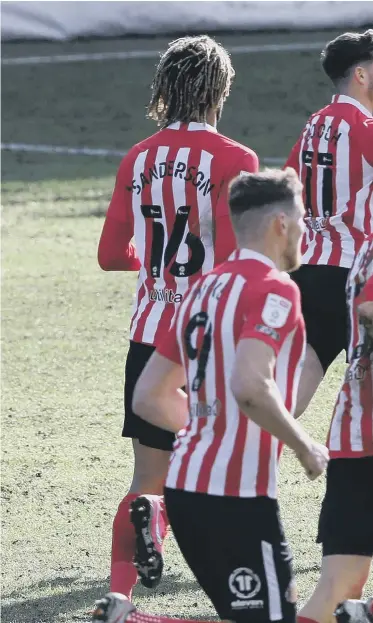  ??  ?? Aiden McGeady celebrates with his team-mates after he scores Sunderland’s equalising goal against