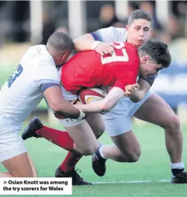  ??  ?? &gt; Osian Knott was among the try scorers for Wales