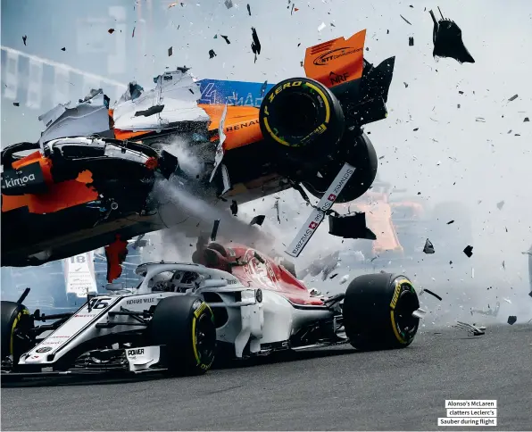  ??  ?? Alonso’s Mclaren clatters Leclerc’s Sauber during flight