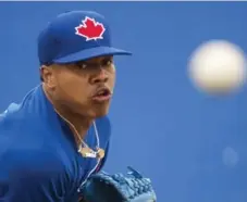  ?? NATHAN DENETTE/THE CANADIAN PRESS ?? After surgery, before he could walk, Marcus Stroman kept his arm strong by practising throwing from a seated position or working on pitching grips.