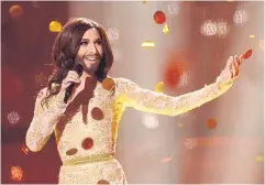  ??  ?? Conchita Wurst representi­ng Austria performs in the Eurovision Song Contest 2014.