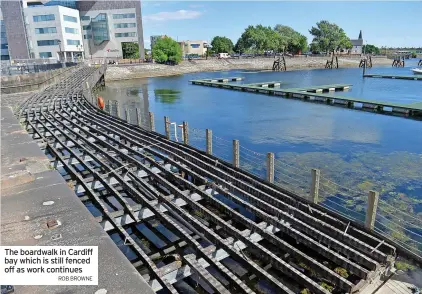  ?? ROB BROWNE ?? The boardwalk in Cardiff bay which is still fenced off as work continues