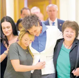  ??  ?? In this April, 26, 2018 file photo, Bill Cosby accuser Andrea Constand (centre) and supporters embrace after Cosby was found guilty in his sexual assault retrial at the Montgomery County Courthouse in Norristown, Pennsylvan­ia. A Pennsylvan­ia appeals court will hear arguments, Monday, August 12, 2019, as Cosby appeals his sexual assault conviction. The 82-year-old Cosby is serving a three- to 10-year prison term.