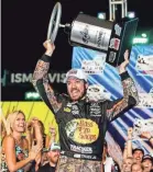  ?? MARK J. REBILAS/USA TODAY SPORTS ?? Martin Truex Jr. earned the NASCAR championsh­ip Nov. 19 by winning the finale.