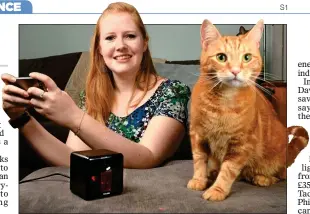  ??  ?? KIT FOR CATS: Keeba Roy can play with her cat Harry remotely via an app