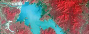  ?? (NASA/METI/AIST/Japan Space Systems) ?? THE BLUE NILE is seen as the Grand Ethiopian Renaissanc­e Dam reservoir fills near the EthiopiaSu­dan border, in this broad spectral satellite image taken last November.