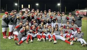  ?? PHOTO BY STEVE FRYER ?? Mater Dei’s baseball team poses after winning the Boras Classic South championsh­ip with a 5-3victory over Corona.