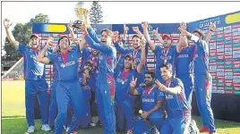  ?? AP ?? ■ Afghanista­n players celebrate after beating West Indies by seven wickets in the WC Qualifier final.